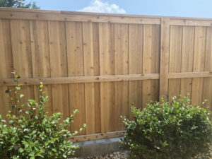 A newly built wood fence in a residential yard, installed by 3A Fencing & Landscaping in Atlanta, GA.
