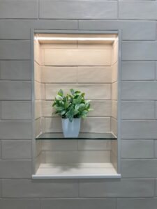 A bedroom with newly installed light-colored wall-to-wall carpet by Burkholder's Flooring America in Hagerstown, MD.