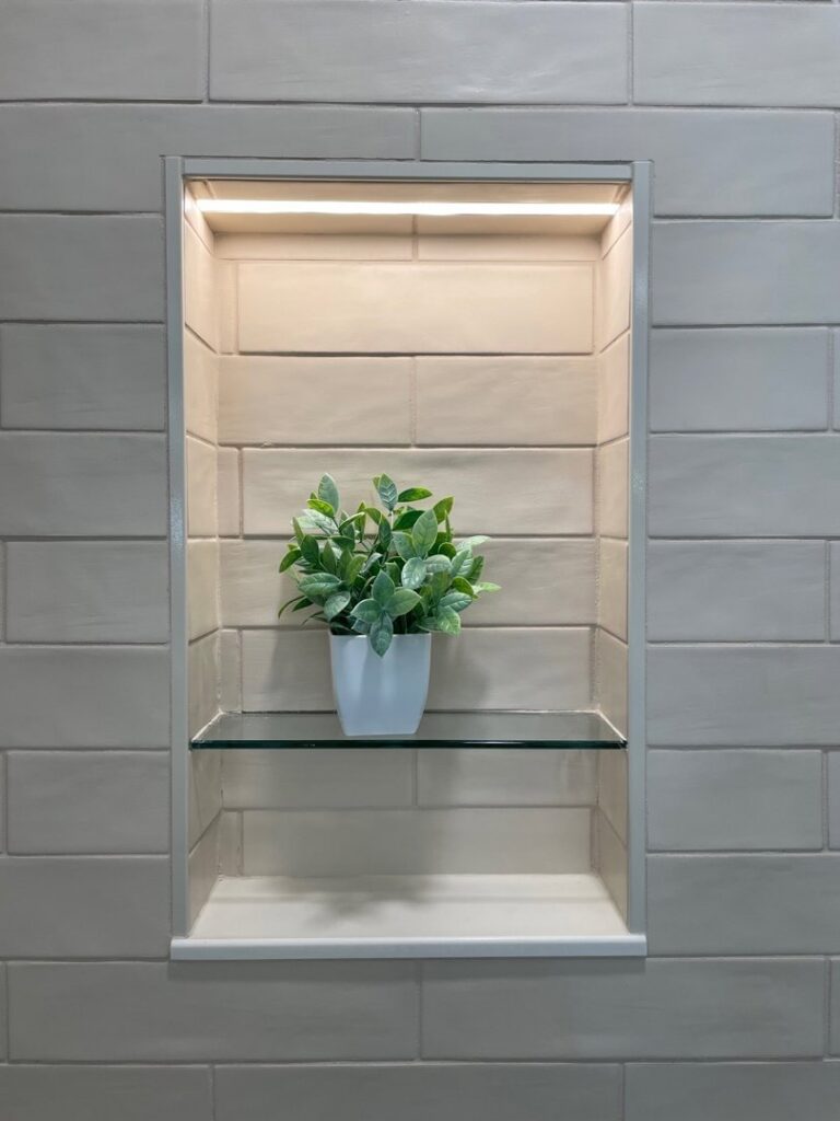 A bedroom with newly installed light-colored wall-to-wall carpet by Burkholder's Flooring America in Hagerstown, MD.