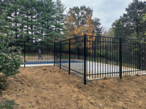 Newly installed black aluminum fence around a residential pool by Wallace Fencing in Cincinnati, OH.