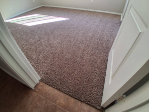 A room with newly installed brown carpet by Integrity Carpet Cleaning Services in Los Gatos, CA.