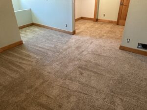 A newly installed brown carpet on a residential staircase by Bush Flooring Center in Cincinnati, OH.