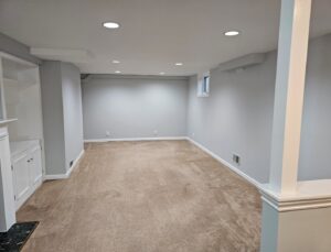 A newly installed brown wall-to-wall carpet in an empty room by Seattle Style Flooring in Seattle, WA.