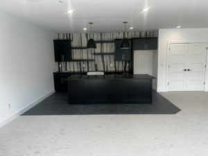 Newly installed light grey carpet in a modern living area by J3 Designs LLC in Wichita, KS