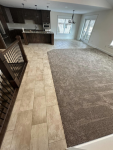 Newly installed carpet in a living area, showcasing a carpet contractor job by Pages Flooring in Springboro, OH.