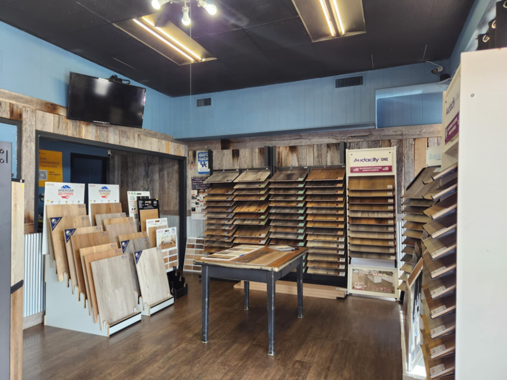 A room with newly installed carpet, showcasing the quality work of Sanders Flooring in Richmond, KY.