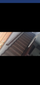 A newly installed carpet on a residential staircase by The Carpet Plaza in Bakersfield, CA