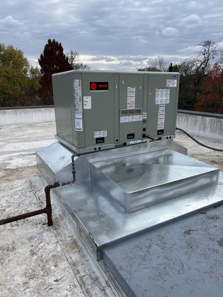 A newly installed commercial rooftop HVAC unit by Fayette Plumbing & HVAC in Lexington, KY.