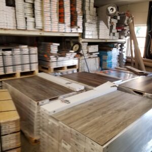 A room featuring newly installed dark gray carpet, showcasing a completed job by Truly Carpet in Cleveland, OH.
