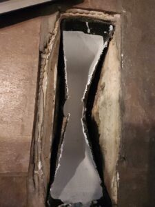 A newly installed or repaired duct lining, showing a clean, white interior within a duct opening by Air Doctor Duct Cleaning & Lining in Tulsa, OK.