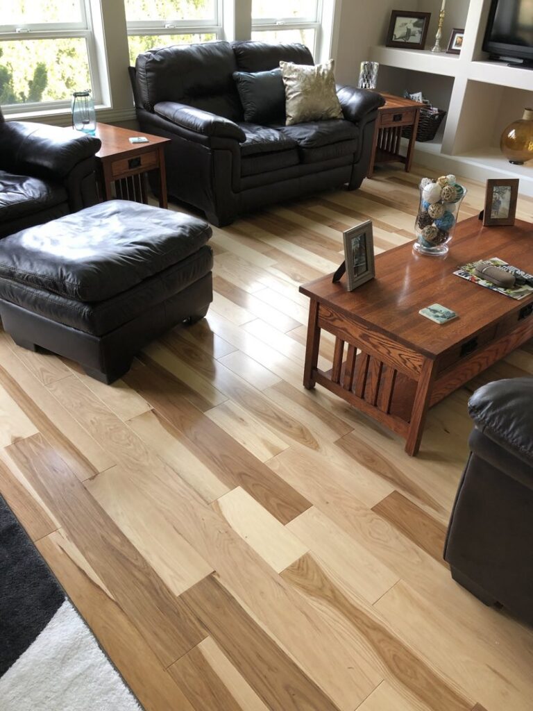 Newly installed gray carpet in a residential room by Carpet USA in Vancouver, WA.