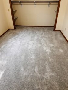 A room featuring newly installed grey carpet by Junge's Flooring, a carpet contractor in Rochester, MN