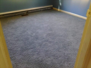 A beautifully newly installed grey carpet in a room by Knights Flooring in South Portland, ME.
