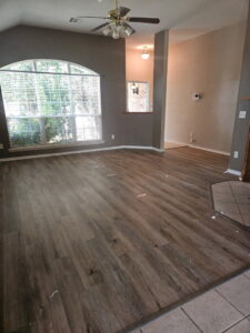 A room featuring a newly installed grey carpet by Floor Coverings International Metro OKC in Moore, OK.