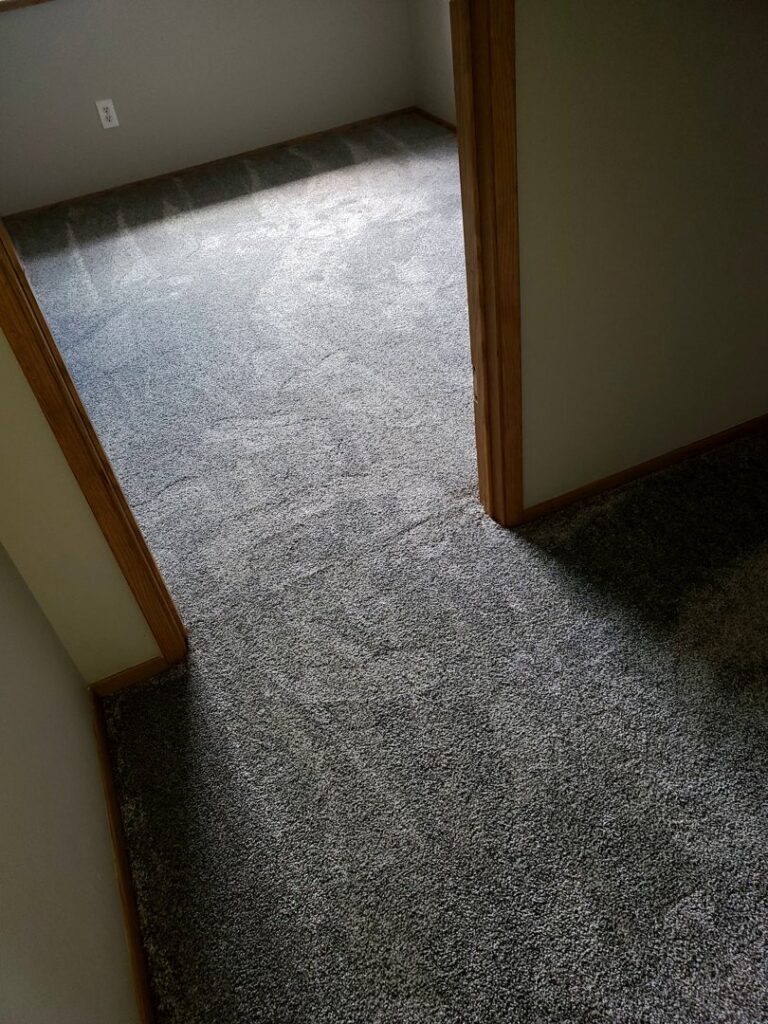 Newly installed grey carpet in a room by Columbia Flooring Group in Troutdale, OR
