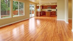 An empty room showcasing newly installed hardwood flooring by Jerry's Carpet Sales and Service in York, PA.
