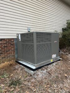 A newly installed outdoor HVAC unit next to a residential building by Parks Heating Cooling Plumbing & Electrical in Indian Trail, NC