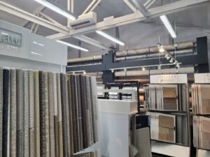 Newly installed laminate wood flooring in a living area by Carpet USA in Vancouver, WA.