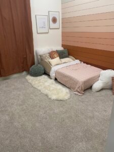 A child's bedroom with newly installed light beige carpet by Vision Flooring in Chandler, AZ.