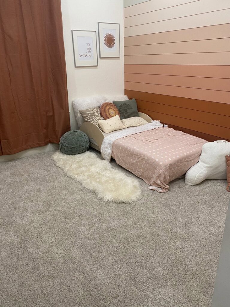 A child's bedroom with newly installed light beige carpet by Vision Flooring in Chandler, AZ.