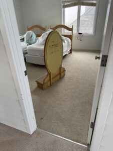 Newly installed light brown carpet in a bedroom by Seaford Flooring in Seaford, DE.