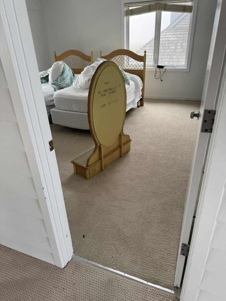 Newly installed light brown carpet in a bedroom by Seaford Flooring in Seaford, DE.