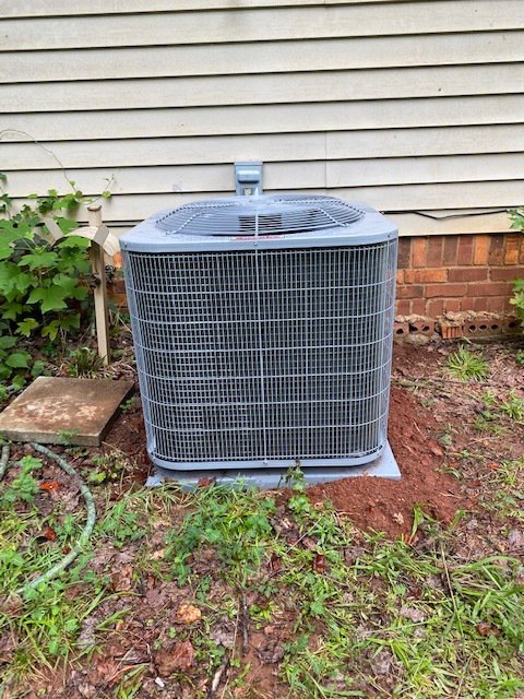 A newly installed outdoor AC unit on a concrete pad by TJ Mechanical Services LLC in Rock Hill, SC.