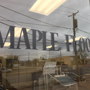 Newly installed blue and grey patterned carpet in a room by Maple Floors in Dallas, TX.