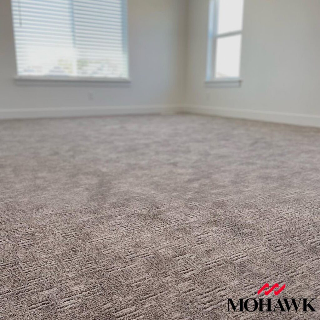 A room featuring newly installed patterned carpet by IDF The Floor Store in Idaho Falls, ID.