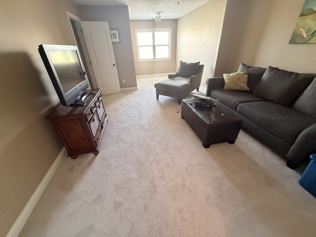 Newly installed light-colored residential carpet in a living room by A Step Above Flooring in Lexington, KY