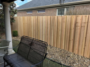 A newly installed wood privacy fence by Rager Fencing & Lawn Care, LLC in Owensboro, KY.