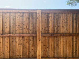 A newly installed wooden privacy fence, showcasing quality craftsmanship by 3A Fencing & Landscaping in Atlanta, GA.