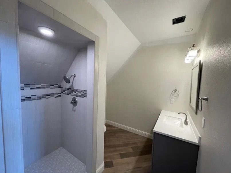 Northern Nevada Electric LLC work trucks parked outside a commercial building in Reno, NV, ready for electrical service.