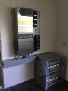 An off-grid power system with inverter and battery rack installed by Big Island Electric & Solar in Hilo, HI