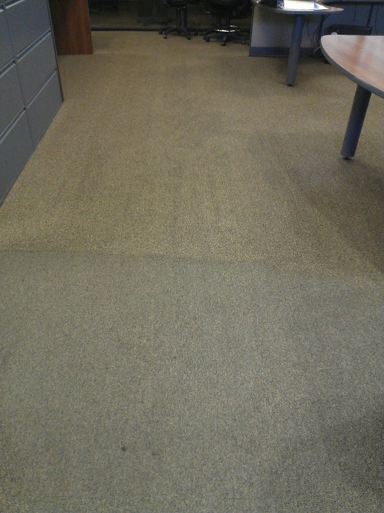 Office carpet showing a clear before and after cleaning section by Revolution Carpet Cleaners in Chandler, AZ