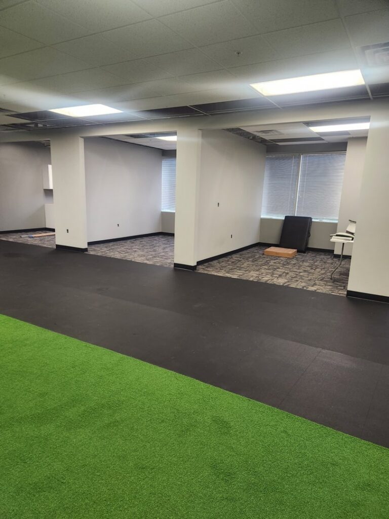 An office space featuring new carpet tile installation by Carpet One Floor & Home Denver in Denver, CO.