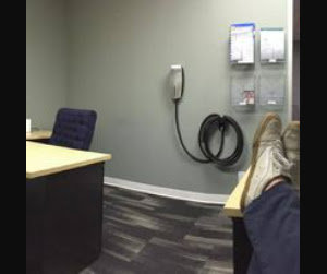 An electric vehicle charger installed in an office environment by BR Electric in Newcastle, OK.