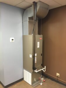 An office HVAC furnace installation with ductwork by Wise Heating & Air Conditioning, LLC in Louisville, KY.