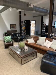 A comfortable office lounge area featuring new carpet installed by Grain Design Flooring in Florence, KY.