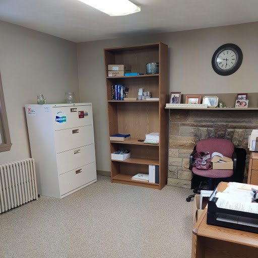 An office room with light-colored carpet installed by Pape's Flooring America in Pittsburgh, PA