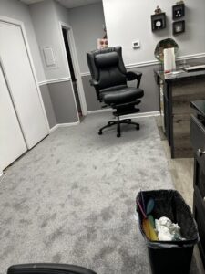 A modern office space with new gray carpet installed by Carpet King and Flooring in Myrtle Beach, SC.