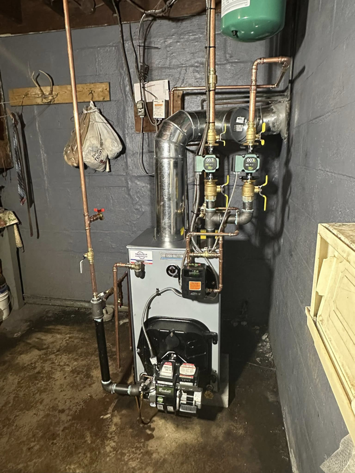 An oil-fired boiler system with a Beckett burner installed by Tapper Energy in Dauphin, PA.