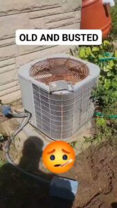 An old and rusted outdoor AC unit labeled "OLD AND BUSTED," indicating a need for replacement by Hodges Heating & Cooling in Owensboro, KY.