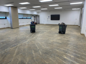 Old carpet removed, revealing the concrete subfloor during a job by Floor Perfection of Arkansas in Conway, AR