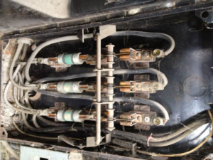 An old electrical fuse panel being serviced by Southern Electrical Services in Houma, LA