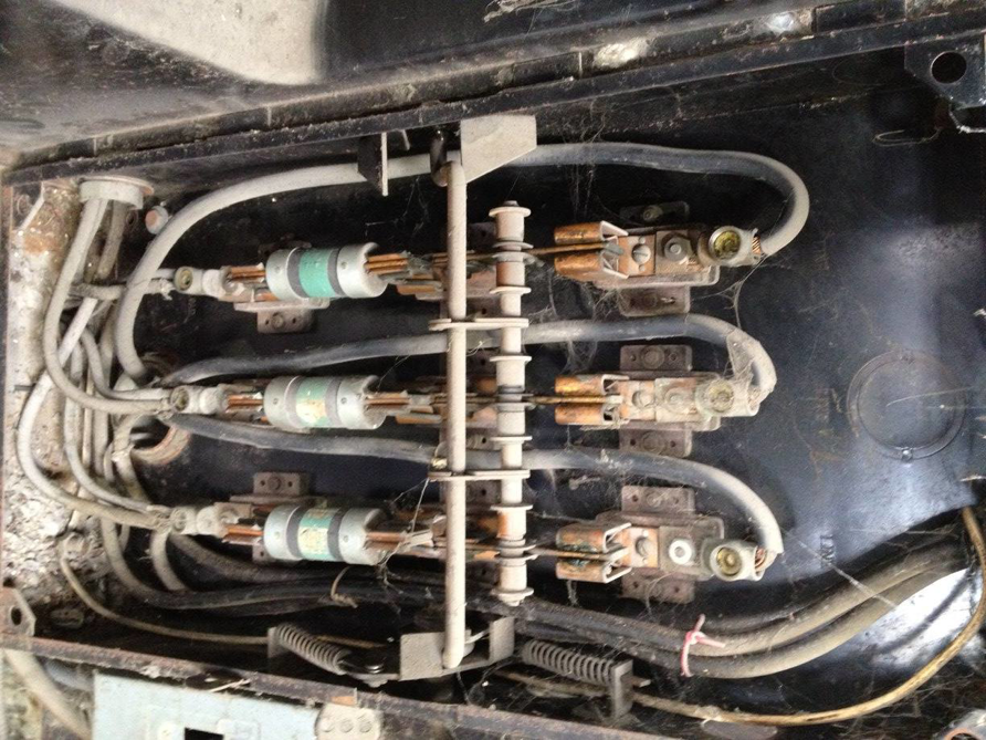 An old electrical fuse panel being serviced by Southern Electrical Services in Houma, LA