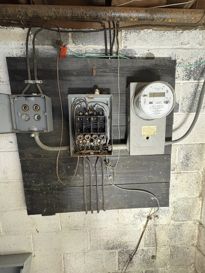 An older electrical panel and meter being upgraded by J Pownall Electric LLC in Hamilton, NJ.