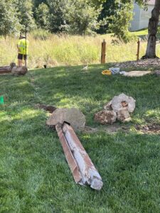 Old fence posts removed and new ones being installed by Sexton Property Services STL in High Ridge, MO.