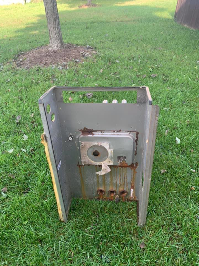 Internal components of an old furnace or air handler unit removed for service by Ammons Mechanical LLC in Durham, NC.