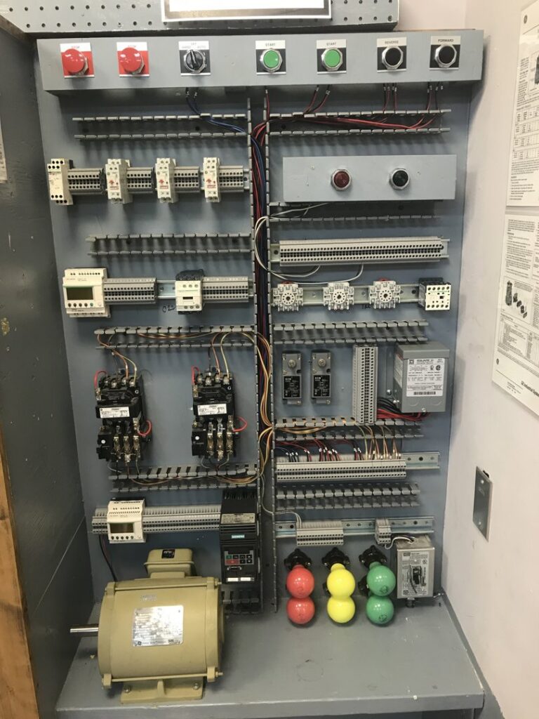 An old fuse box with various fuses and wiring, representing electrical systems serviced by High Electrical in Atlanta, GA.